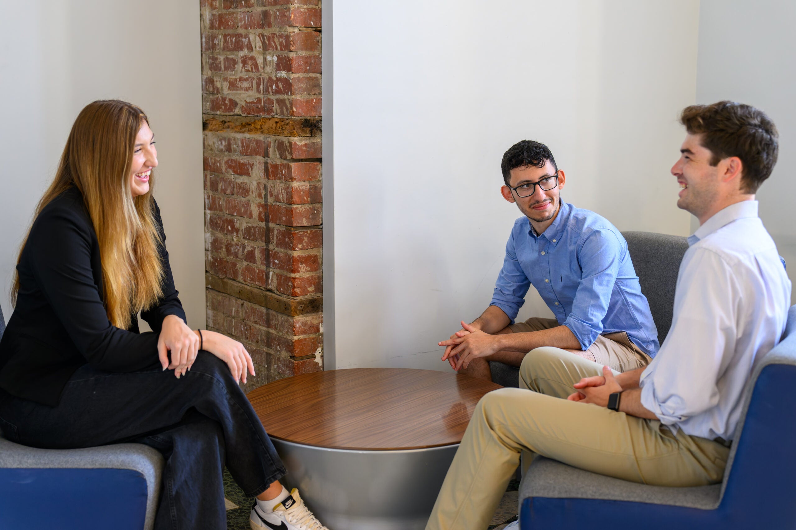 Students talking in chairs