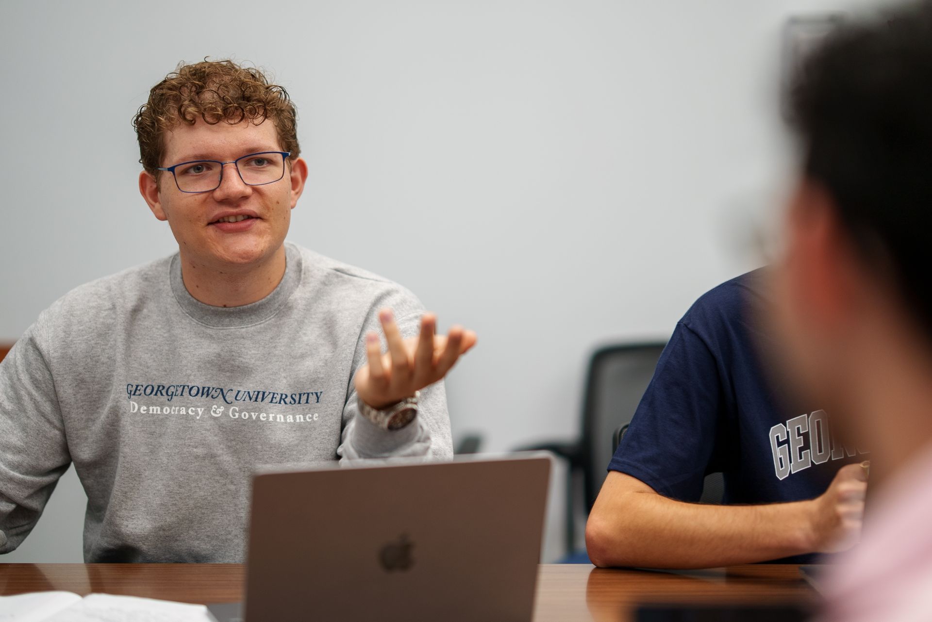 A student talking in class.